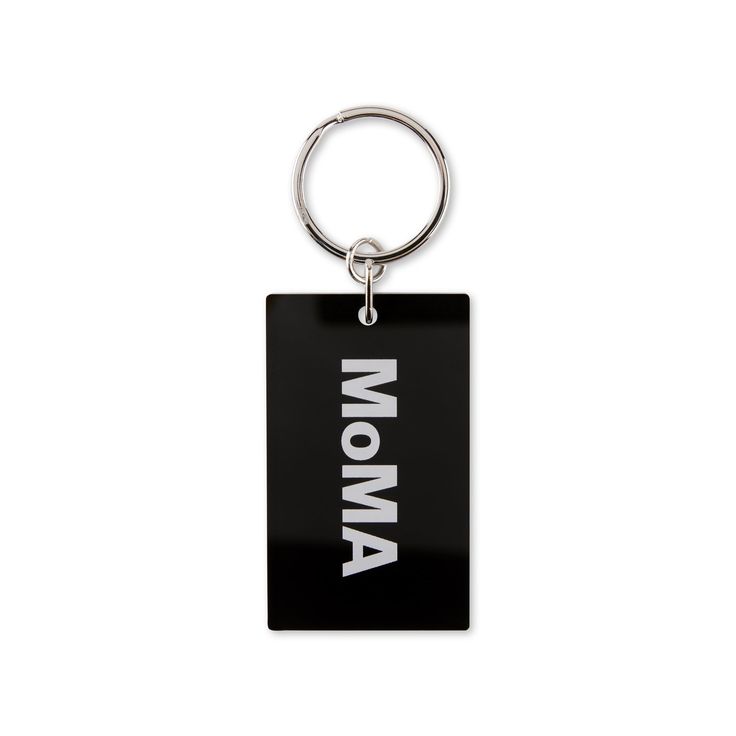 a black and white keychain with the word'monna'printed on it