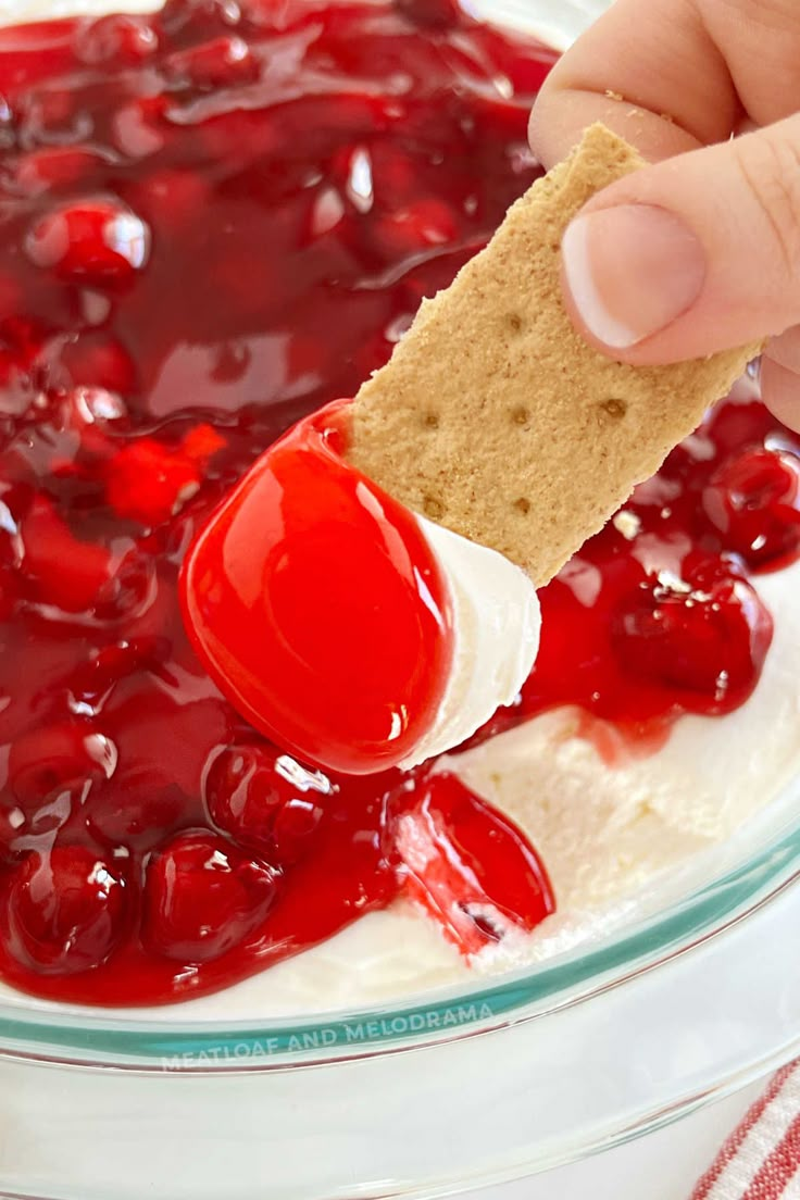 cherry cheesecake dip recipe in a glass bowl