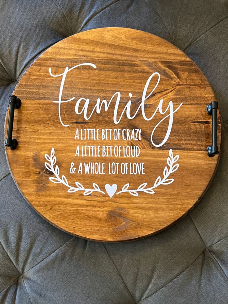 a wooden sign with the words family on it