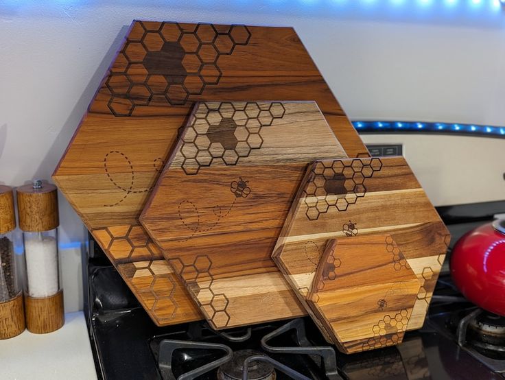 a stove top that has some kind of wooden object on it's burner