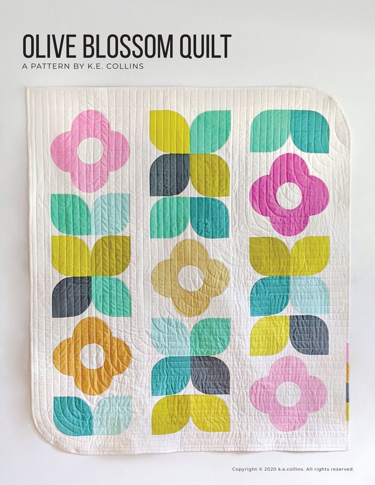 an image of a colorful quilt on the cover of a book, olive blossom quilt