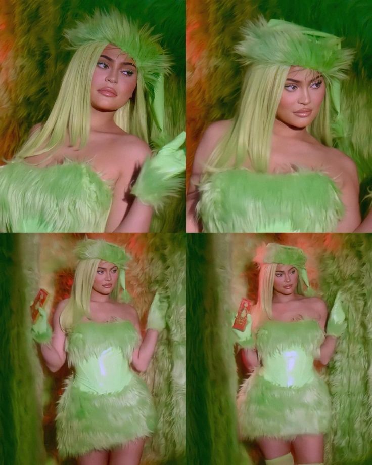 a woman in a green feathered outfit