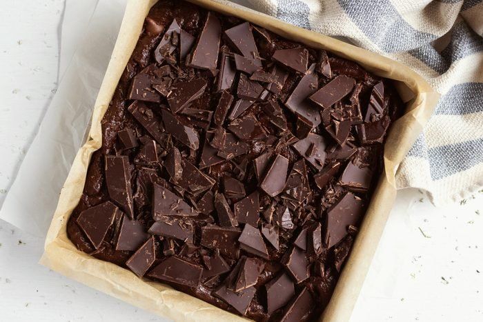 a pan filled with chocolate on top of a table