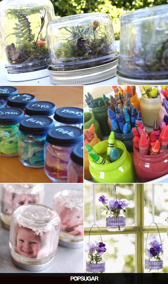 there are many different things in jars on the table and one is filled with plants