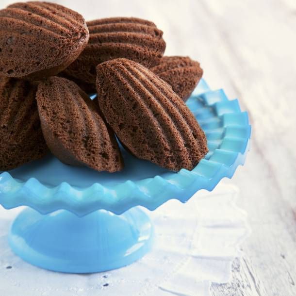 some cookies are sitting on a blue plate