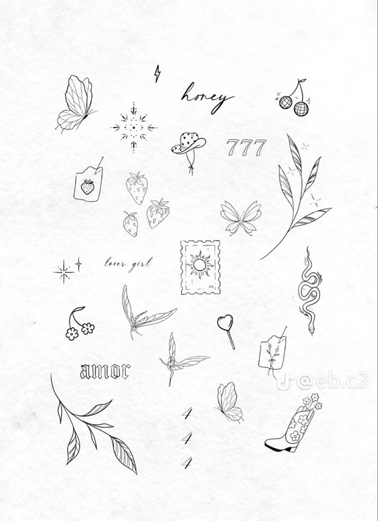 an image of various tattoos drawn on paper