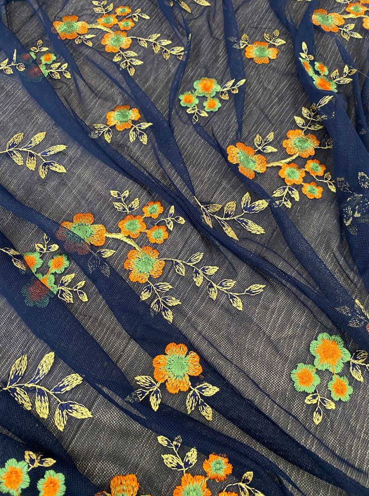 power mesh, navy floral power mesh fabric, orange floral pattern, 4 way stretch fabric, power mesh online store usa, blue color fabric, kiki textiles, soft mesh fabric Blue Floral Embroidered Dupatta For Summer, Summer Blue Dupatta With Floral Embroidery, Spring Multicolor Embroidered Dupatta, Spring Festive Multicolor Dupatta, Summer Floral Print Multicolor Dupatta, Summer Dupatta With Multicolor Embroidery, Bohemian Blue Dupatta For Spring, Multicolor Embroidered Fabric For Spring Festivals, Spring Festive Multicolor Embroidered Fabric