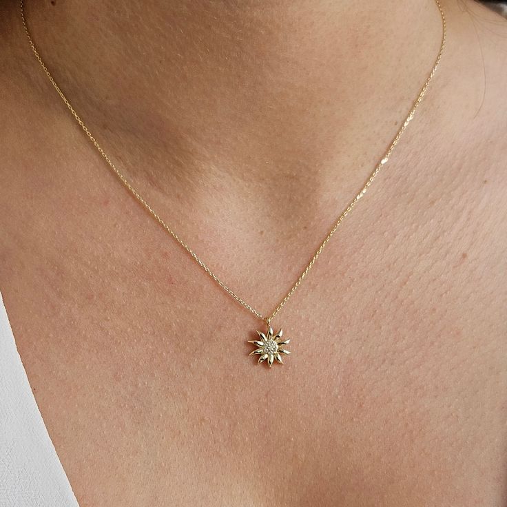 This 14K Gold Sun Necklace is designed carefully to brighten your neck. It is suitable for everyday use as well as for your special days. Can be a perfect gift with its stylish and ambitious look. The sun holds great significance in many cultures and civilizations throughout history. People often wear symbols that resonate with their personal beliefs, values, and identity. Wearing sun-themed jewelry can symbolize a deep connection to nature. It may represent personal growth, change, and the pote Gold Sun Necklace, Personal Beliefs, Sunshine Necklace, Solid Gold Charms, Gold Sunburst, Sun Necklace, History People, Sun Pendant, Gold Sun