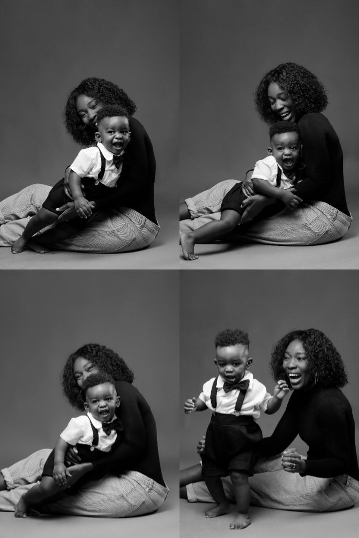 two women and a child are sitting on the floor with their arms around each other