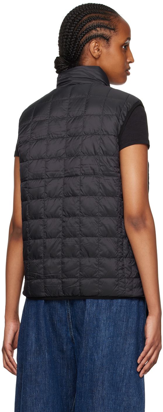 Reversible down-filled quilted nylon ripstop vest. Reverse in black sherpa fleece. Cotton-blend twill trim throughout. · Stand collar · Zip closure · Zip pockets · Elasticized hem and armscyes · Logo patch at interior chest · Zip pockets at interior Supplier color: Black/Black Fill: 95% down, 5% feather. Down Vest, Black Quilt, Sherpa Fleece, Stand Collar, Patch Logo, Zip Pockets, Cotton Blend, Women Wear, Trim