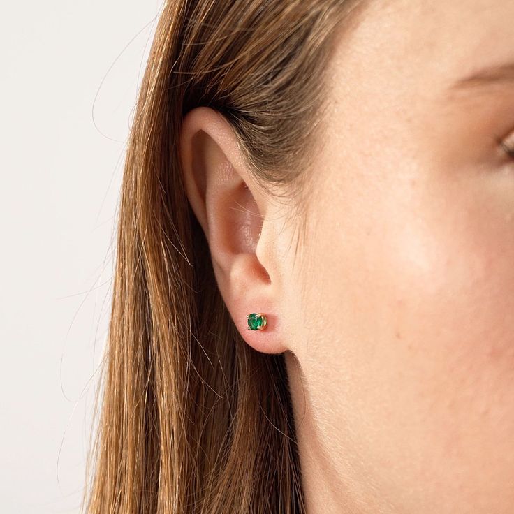 1- P R O D U C T ∙ D E S C R I P T I O N Adding a new dimension to your colorful diamond earrings. Get your newest piece to elevate your outfit because, remember, your day deserves a green whisper. 2- P R O D U C T ∙ D E T A I L S Gemstone quality: * Stone type: Emerald  * Emerald Carat: 0.40 ct. * Setting type: Prong Setting  Dimensions: * Height: 4 mm / 0.15 inch * Width:  4 mm / 0.15 inch Gold material: 14K solid gold Choice of gold color: Yellow gold, Rose gold, White gold 3- S H I P P I N G Fine Jewelry Earrings For May Birthstone, Diamond Earrings For May Birthstone Gift, Minimalist Yellow Gold Earrings For May Birthstone, Minimalist 14k Gold May Birthstone Earrings, Minimalist Yellow Gold May Birthstone Earrings, Minimalist Green Earrings For Anniversary, Green Minimalist Earrings For Anniversary, Minimalist Gemstone Earrings For May Birthstone, Classic Everyday Earrings For May Birthstone