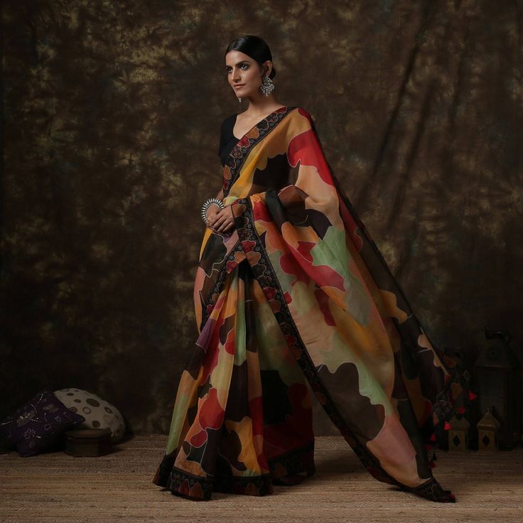 Print sarees are versatile and stylish garments that come in a wide range of prints, including florals, geometric patterns, and abstract designs. They also feature handloom prints like Kalamkari and Batik sarees. These sarees are suitable for both casual and formal occasions and can complement any skin tone. Explore our exclusive collection of print sarees. Festive Georgette Kalamkari Dupatta, Festive Multicolor Unstitched Pre-draped Saree, Georgette Dupatta With Kalamkari Print In Traditional Drape, Festive Multicolor Chanderi Pre-draped Saree, Bollywood Style Multicolor Pre-draped Saree For Navratri, Bollywood Multicolor Pre-draped Saree For Navratri, Traditional Kalamkari Print Georgette Pre-draped Saree, Traditional Kalamkari Pre-draped Georgette Saree, Multicolor Silk Pre-draped Saree With Kalamkari Print