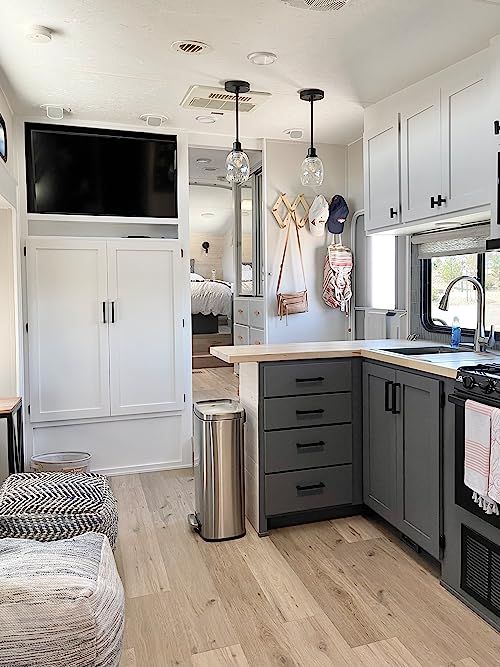 the kitchen is clean and ready to be used as a living room or dining area