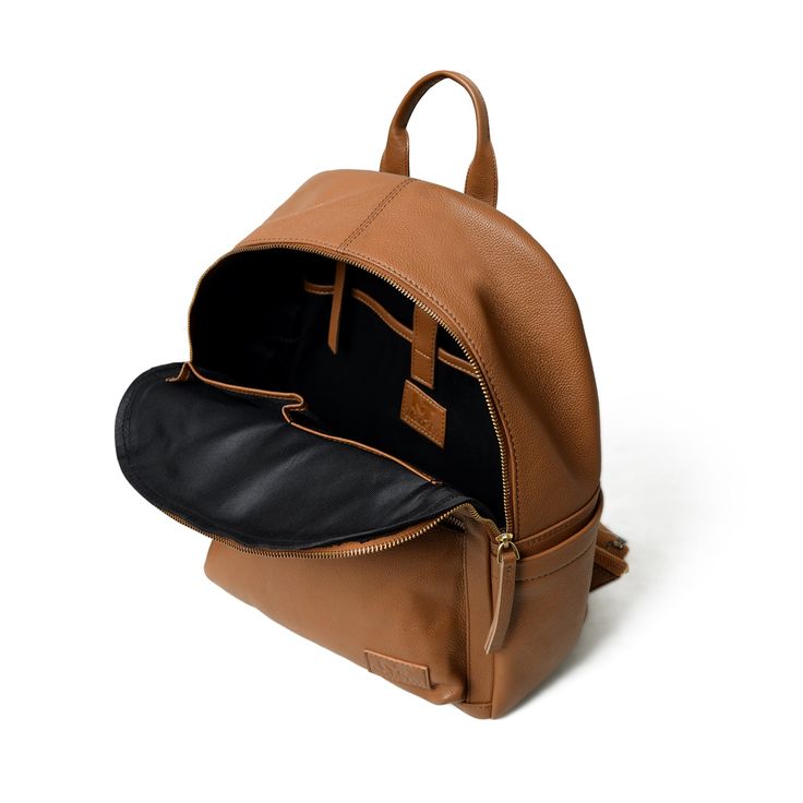 Uplift your everyday style with our Light Brown Women's Backpack, a perfect fusion of fashion and function. Meticulously handcrafted by skilled artisans, this backpack is a testament to their craftsmanship. Made from top-grain buffalo leather, it exudes durability and a luxurious feel. The convenient zipper closure ensures the safety of your essentials, making it ideal for college, office, or outings. With ample space and comfortable straps, it effortlessly combines practicality and elegance. El Everyday Rectangular Leather Backpack With Gold-tone Hardware, Rectangular Leather Backpack With Gold-tone Hardware For Travel, Chic Leather Backpack With Zipper Pocket For On-the-go, Brown Leather Travel Backpack With Anti-theft Pocket, Rectangular Brown Leather Backpack With Anti-theft Pocket, Buffalo Leather, Light Brown, Womens Backpack, Tan Leather