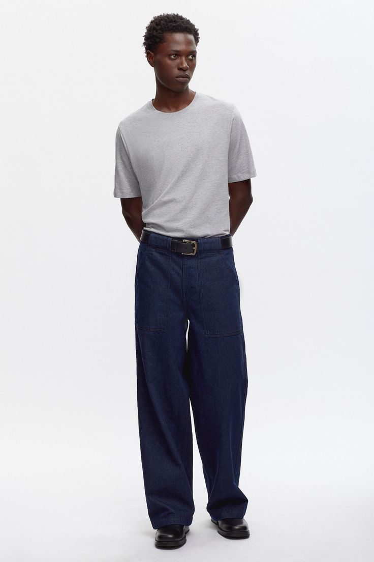 The Matai Denim combines utility-inspired details with modern craftsmanship. Featuring thick belt loops, bar tacks in place of fly stitching, and a unique front leg panel shaping. Crafted in two options, the contrasting pair stands out with luxe Manteco wool on the front panels and back pockets, while the other pair remains classic. Designed with a wide fit and regular length, and crafted in a recycled cotton blend. Luxury Wide Leg Men's Jeans, Streetwear Rigid Denim Pants With Standard Cut Leg, Men’s Wide Leg Jeans, Rigid Denim Straight Pants For Streetwear, Luxury Rigid Denim Men's Pants, Thick Belt, Jean Top, Men's Jeans, Wide Leg Denim