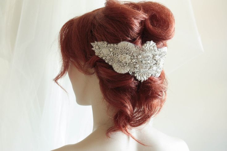 Vintage inspired beading gives a nostalgic picturesque look to every wedding attire. Each piece is carefully handcrafted using opulent swarovski stones and silk thread, making it a perfect heirloom head dress Colors : Ivory, offwhite and silverLength = 10 inchesMax width in the center is about 4 approximatelyFastening Options:1. Small comb on either side2. Ribbon - if you would like to wear this as a headband Shipping : Made to order, please allow 4 to 6 weeks to complete work Shop Policy : Due Elegant Crystal Headpieces For Weddings, Silver Embellished Wedding Headpiece, Silver Embellished Headpiece For Wedding, Elegant Silver Beaded Headpiece, Embellished Crown Headpiece For Weddings, Elegant Embellished Crown Headpiece, Elegant Wedding Crown Headpiece, Elegant Embellished Bridal Accessories For Ceremony, Beaded Wedding Hair Accessories Headband