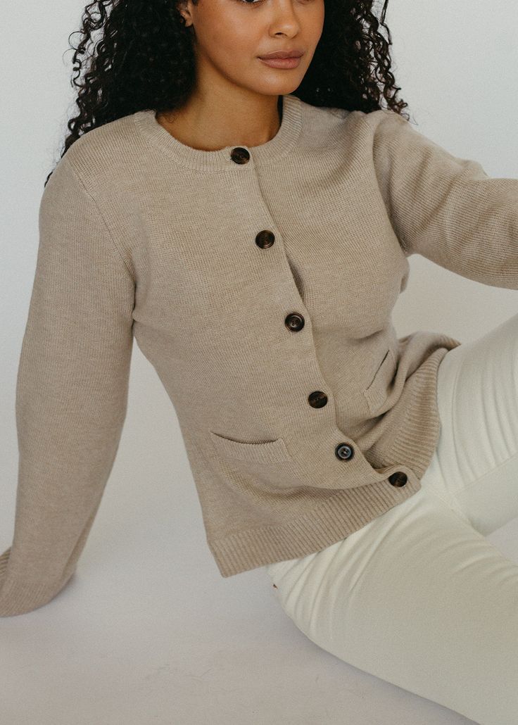 The Port Cardigan has a structured sillouette and bell sleeves to give it a feminine, flattering shape. The contrasting buttons are so chic and the material is ultra soft. This fitted button up cardigan will become a staple in your closet. Model is 5'8" wearing a size medium Closet Model, Pregnancy Must Haves, Button Up Cardigan, Nursing Friendly, Beige Cardigan, New Instagram, Bell Sleeves, Must Haves, Button Up