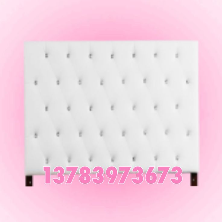 a white headboard with buttons on it and the words 788973873