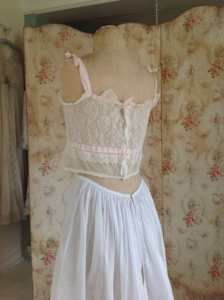 "amazing silk cotton camisole, in excellent condition. this camisole will be a beautiful summer top or wedding top.. the ribbons are pure silk with a woven pattern. the lace is Chantilly lace measurements: bust 86 cm 34\" waist 76 cm 30\" length 40 1/2 cm 16\" this top will be shipped with insurance" Underbust Lace Bodice With Lace Trim, Sleeveless Lace Bodice Summer Corset, Coquette Lace Camisole, White Lace Bodice With Lace Trim, Feminine Wedding Corset With Lace Trim, Summer Lace Corset With Lace Top Detail, Feminine Lace Corset With Lace Bodice, Feminine Lace Corset With Lace Trim, Feminine Lace Bodice Corset