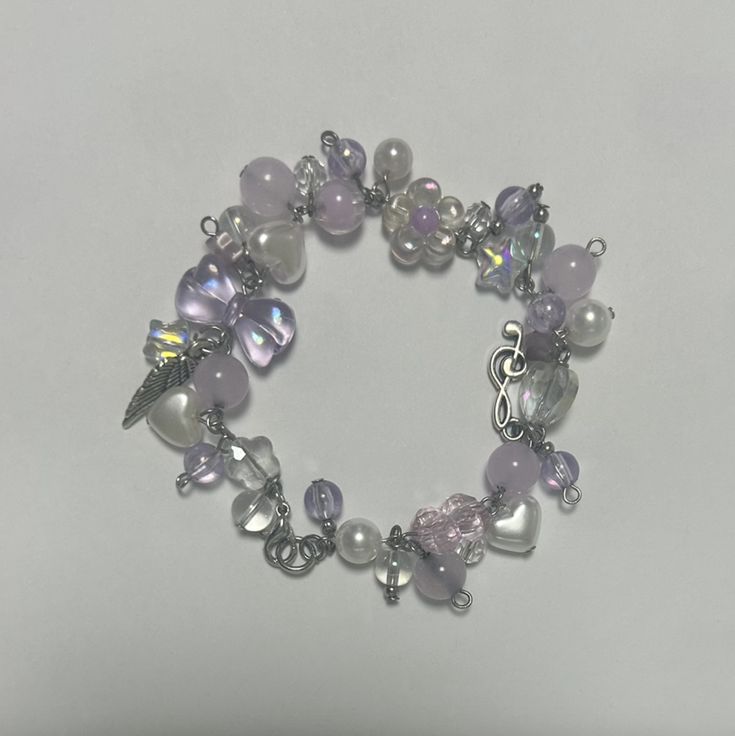 Purple Charm Bracelet, Fimo Beads Bracelet, Purple Bead Bracelet Ideas, Cluttered Bracelets, Jewelry Kpop, Girly Bracelets, Purple Beaded Bracelets, Shish Kebab, Beaded Charm Bracelet