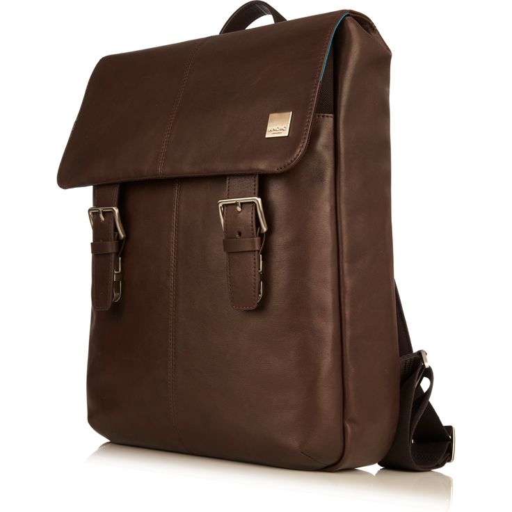 Hudson is a city backpack made from full-grain leather. Features a classic design with a flap, fastening with two quick-release push locks, (hidden beneath traditional mock-buckles) and offers a top carry handle and comfortably padded shoulder straps. Small exterior pocket. Hudson has padded, adjustable shoulder-straps. When you're not wearing the backpack they hang flat against the body of the bag, to avoid knocking your legs as you walk.Material: The leather used for the Hudson is a luxurious Classic Leather Backpack For Work, Classic Leather Flap Backpack, Classic Travel Bags With Buckle Closure, Leather-backed Backpack For Work, Rectangular Leather Backpack With Hasp Closure, Brown Leather Backpack For Work, Classic Backpack With Flap, Classic Leather Backpack With Detachable Strap, Leather Satchel With Buckle Closure For Travel