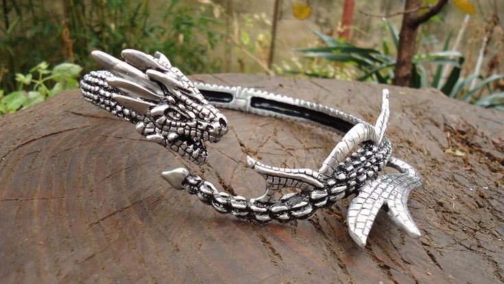 Here is one more version of the famous dragon necklace,this one is a bit cut down, suitable for all those who would like to wear it more often. The dragon necklace in its full glory, the magnificent silver dragon choker for women or men, a true special occasion gift. It can also be used as a part of a costume for girls in cosplay. It is hand modeled in wax and cast using standard jewelry making methods, never loses color and never causes skin rashes or reactions, it is in a way eternal. It can b Dragon Choker, Skin Rashes, 3d Dragon, Costume For Girls, Witch Shop, Witchy Crafts, Dragon Necklace, Hand Model, Silver Dragon