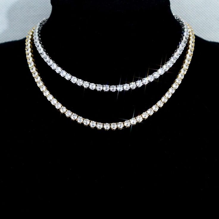 Opens a new tabLet your style shine through this 18k White Gold Plated Tennis Necklace made with Swarovski Crystal. We carry the matching bracelet at our eBay store. #uniquefashionjewelryboutique #tennisnecklace #swarovskicrystal #jewelrylover #diamondjewelry• Condition: New• This Sale Includes: One white gold plated necklace only. We sell the gold version separately at Our eBay Store • Metal Setting: 18k White gold plated copper • Stones: Beautiful 4mm round prong-set Swarovski crystal diamond Unique Fashion Jewelry, New Tablets, Crystal Diamond, Matching Bracelet, Tennis Necklace, Matching Bracelets, Gold Plated Necklace, Diamond Crystal, Jewelry Lover