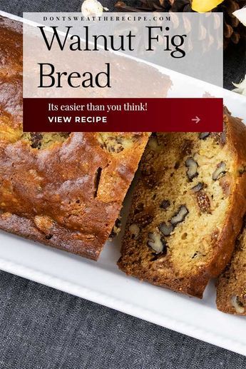 a white plate topped with slices of banana bread