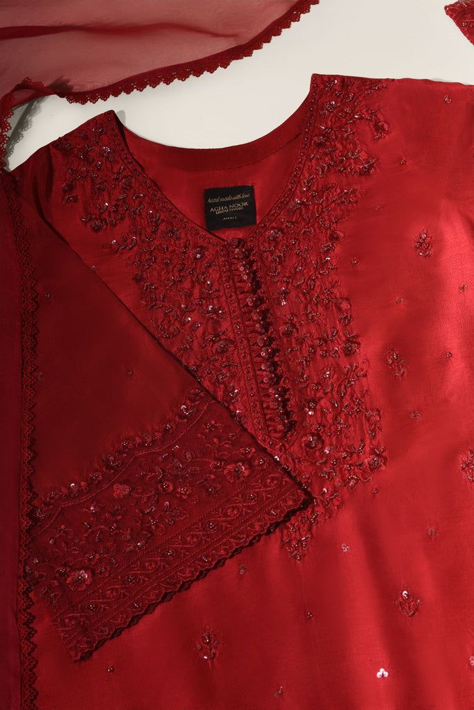 Ashdeen Elegant Red Unstitched Festive Suit, Elegant Red Unstitched Suit With Dabka, Elegant Chinon Churidar For Formal Wear, Elegant Chinon Churidar For Formal Occasions, Elegant Formal Churidar In Chinon, Elegant Red Chinon Unstitched Suit, Elegant Red Unstitched Suit In Chinon, Elegant Red Unstitched Chinon Suit, Elegant Red Raw Silk Salwar Kameez