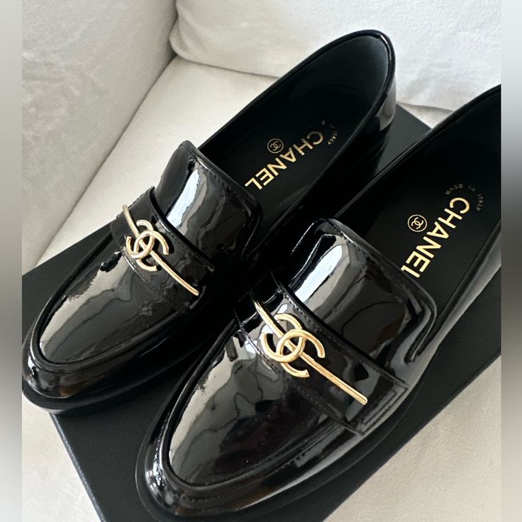 Brand New Never Worn Black Chanel Patent Leather Loafers. Box And Dust Bags Included. Purchased At The Chanel Boutique Inside Bloomingdales Nyc Luxury Patent Leather Loafers With Branded Insole, Luxury Patent Leather Pointed Toe Loafers, Elegant Patent Leather Loafers, Luxury Patent Leather Flat Heel Loafers, Elegant Patent Leather Loafers For Galas, Luxury Patent Leather Loafers For Formal Occasions, Luxury Evening Loafers With Round Toe, Luxury Round Toe Loafers For Evening, Designer Black Loafers For Party