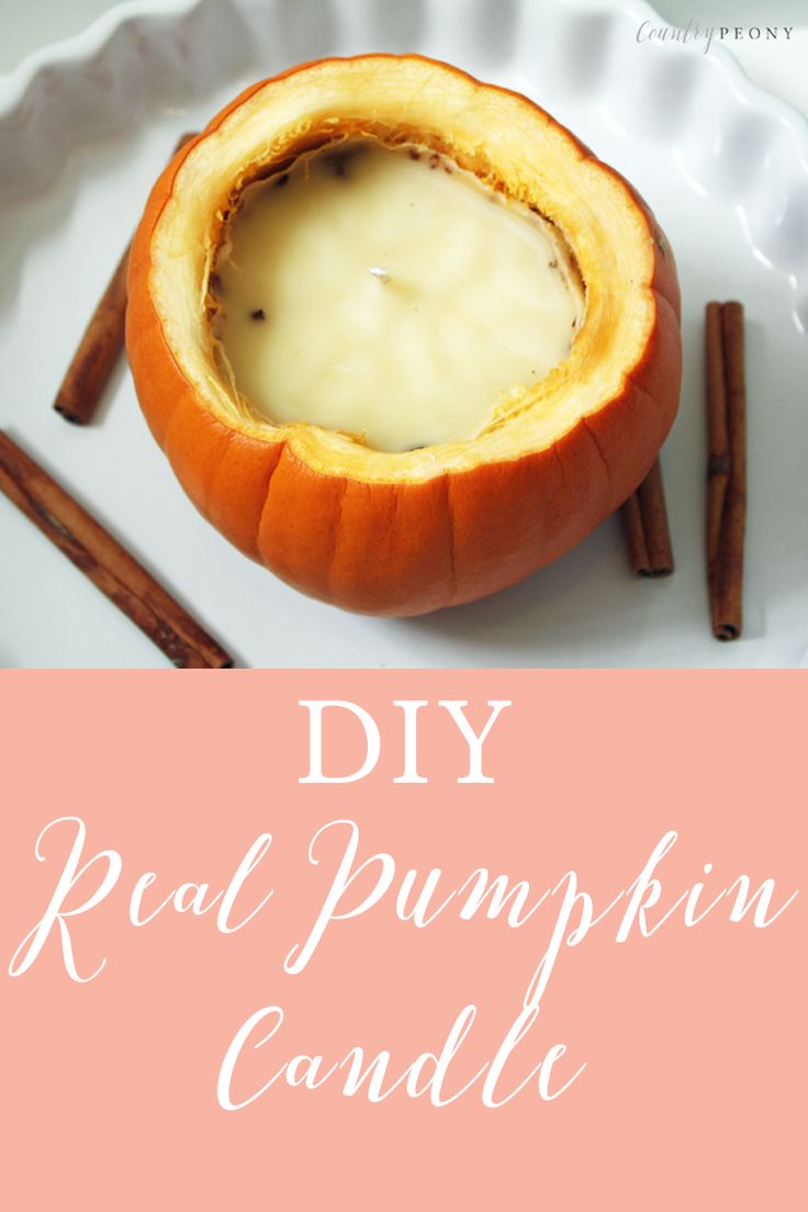 a white plate topped with an orange pumpkin and cinnamon sticks next to the words diy real pumpkin candle