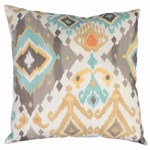 a decorative pillow with an orange, yellow and blue design on it's side