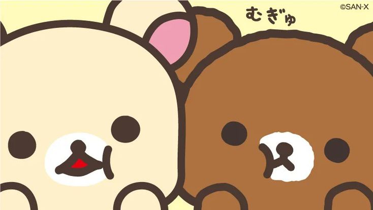 two brown and white teddy bears standing next to each other with chinese characters on them