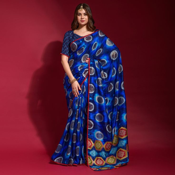 Blue colored saree is made from art silk fabric which is highlighted with beautiful geometric pattern with foil print work as shown. comes along unstitched art silk blouse piece which you can customise as per your design/style. Occasion - You can wear this saree for parties, festive and functions ideal for any fashionista. Note:- The actual product may differ slightly in color and design from the one illustrated in the images when compared with computer or mobile screen. Blue Saree With Printed Border For Festivals, Bollywood Style Georgette Digital Prints For Festivals, Bollywood Style Digital Print Pre-draped Saree For Diwali, Festive Digital Print Georgette Saree, Festive Georgette Digital Print Saree, Festive Georgette Saree With Digital Prints, Blue Bandhani Print Blouse Piece For Festivals, Blue Dupatta With Printed Border For Diwali, Festive Blue Dupatta With Printed Border