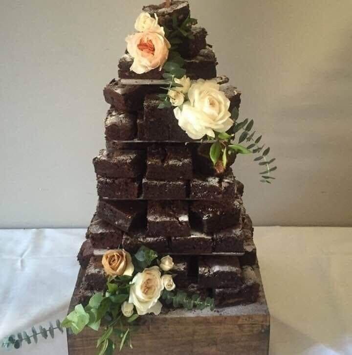 there is a cake made out of brownies and flowers