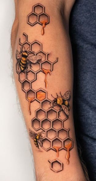 honeycombs and bees tattoo on the arm