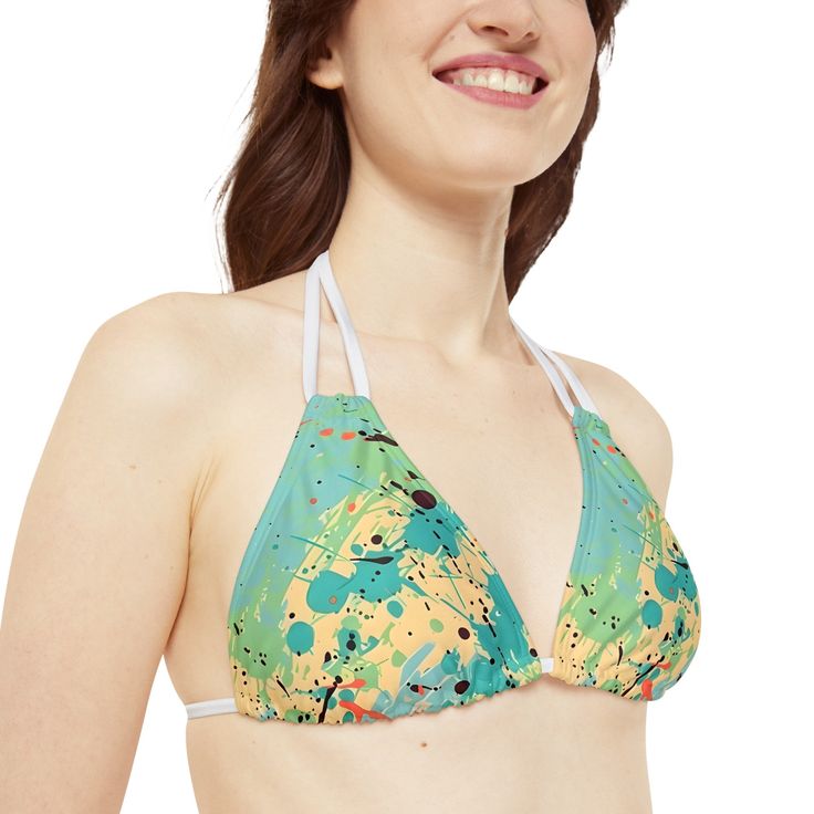 Experience the vibrant energy of our Women's Vibrant Cerulean Splash Strappy Bikini, inspired by our Splash Collection. This eye-catching bikini features a unique design blending shades of Cerulean, Peach, Maroon, and Lime Green. Crafted from an 82% microfiber polyester and 18% spandex blend, this bikini offers a stretchy, medium-weight fabric that is both comfortable and flattering. The top includes removable cups for customizable coverage and comfort. The bikini's adjustable elastic straps ens Multicolor T-back Swimwear For Sunbathing, Multicolor T-back Swimwear For Beach Party, Vibrant Triangle Top Swimwear For Beach, Multicolor T-back Swimwear For Beach, Multicolor T-back Swimwear, Vibrant Triangle Top Swimwear For Sunbathing, Green T-back Swimwear For Beach, Multicolor T-back Summer Swimwear, Adjustable Tropical Multicolor Swimwear