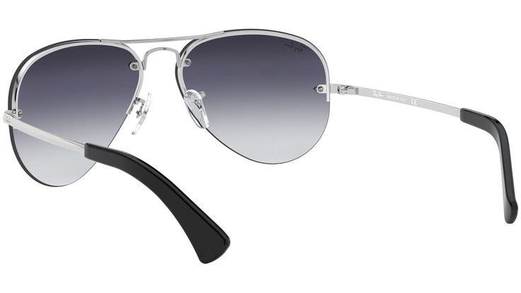 Ray-Ban RB3449 iconic Aviator™ sunglasses are a semi-rimless update of the classic Large Metal Aviator, originated in 1937. These lightweight Aviator sunglasses are decorated with darted metal grommets and secure lightweight temples while delivering a sporty aesthetic to some of the coolest sunglasses in history. The flat edged metal temples finished with plastic end tips are a distinct characteristic. They come in mirrored and polarized style options. Sporty Aesthetic, Ray Ban Aviators, Cool Sunglasses, Aviator Sunglasses, Ray Ban, Ray Bans, Balenciaga, Sunglasses, Grey