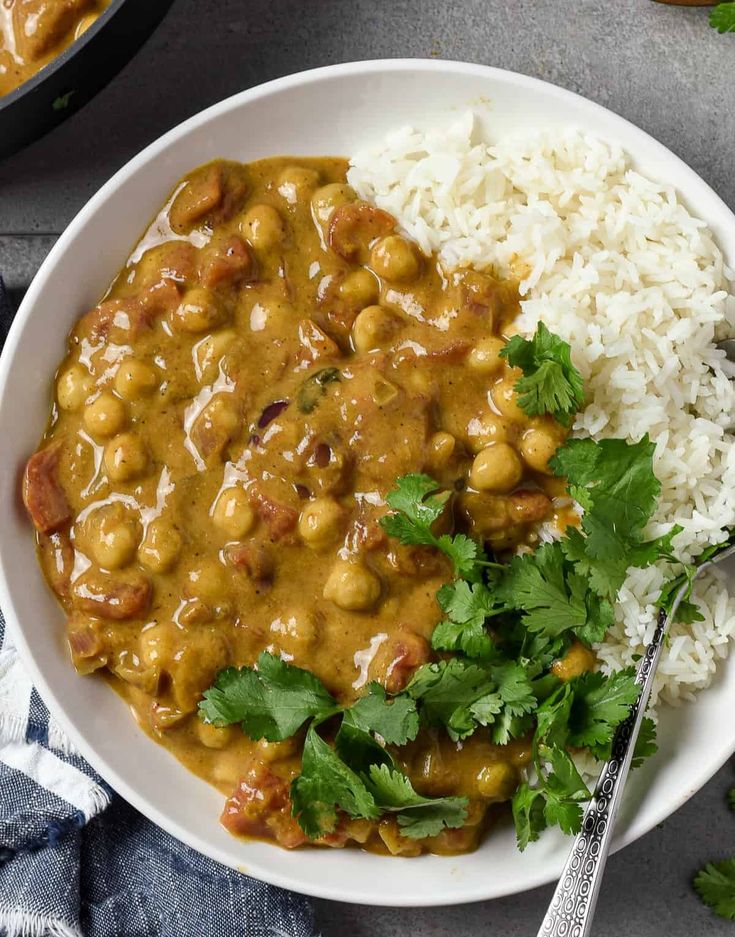 a white bowl filled with rice and beans