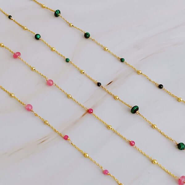 Elevate your everyday look with our Dainty Precious Stone Bead Necklace. The delicate chain showcases varying sizes of beautifully placed stone balls, offering a touch of daintiness to any outfit. Perfect for layering or wearing on its own, this versatile necklace will effortlessly take you from casual to dressy occasions. Material Composition: 18k gold plated brass, natural stone beads Lead and Nickel free Designed in US Gift Crystal Necklaces With Delicate Chain And Round Beads, Dainty Beaded Necklaces With Round Beads And Adjustable Chain, Gift Delicate Chain Beaded Necklace With Round Beads, Delicate Beaded Necklaces With Adjustable Chain, Dainty Gemstone Beaded Necklaces, Layering Beaded Necklaces With Adjustable Chain, Delicate Beaded Chain Necklace With Round Beads, Gold Dainty Crystal Necklace With Colorful Beads, Dainty Necklace With Round Beads