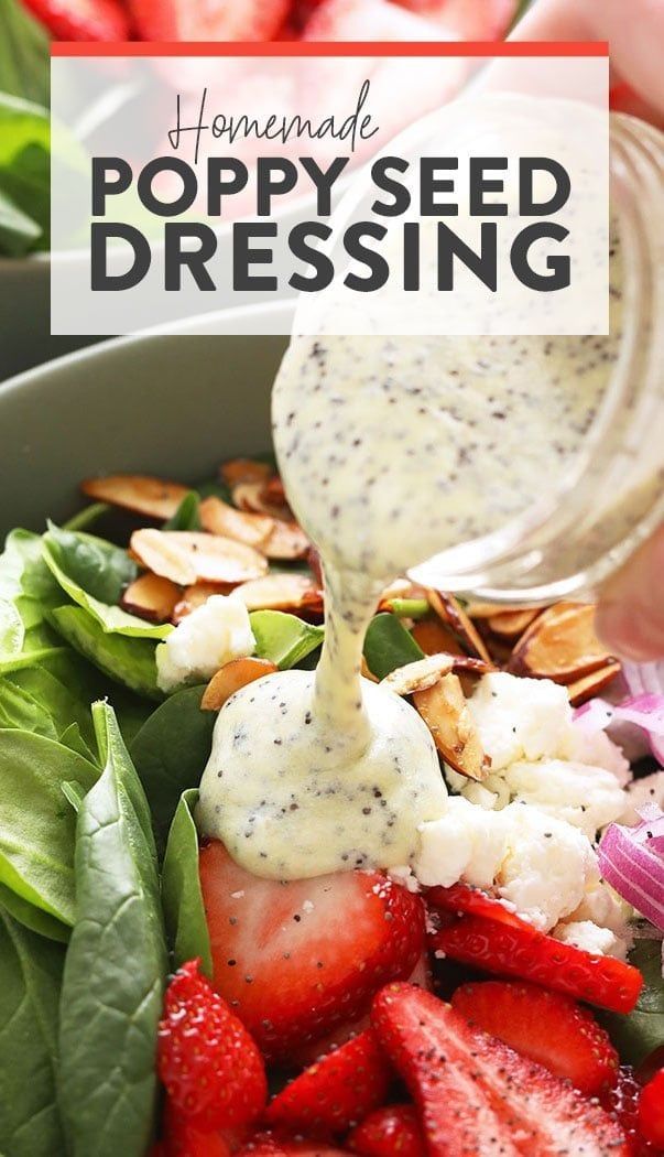 homemade poppy seed dressing being drizzled over a salad