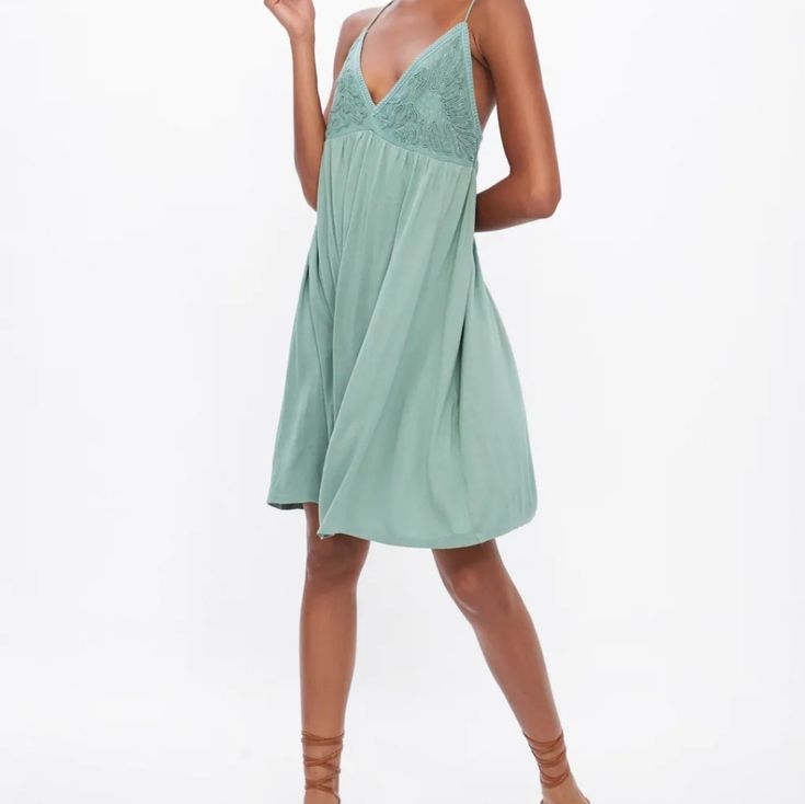 Brand: Zara Description: Nwt Great Condition No Flaws* Sleeveless Style Dress* Embroidered Front Detail* Lightweight Stretchy Material Color: Mint Green Size: Medium Pit-Pit:16" Length: 39" Cotton Cami Mini Dress, Chic Cami Sleeveless Dress For Summer, Chic Sleeveless Cami Dress For Summer, Chic Cami Sleeveless Summer Dress, Stretch Beach Dresses With Lace Trim, Spring Green Halter Neck Slip Dress, Green Camisole Slip Dress For Summer, Stretch Mini Slip Dress For Spring, Stretch Mini-length Slip Dress For Spring