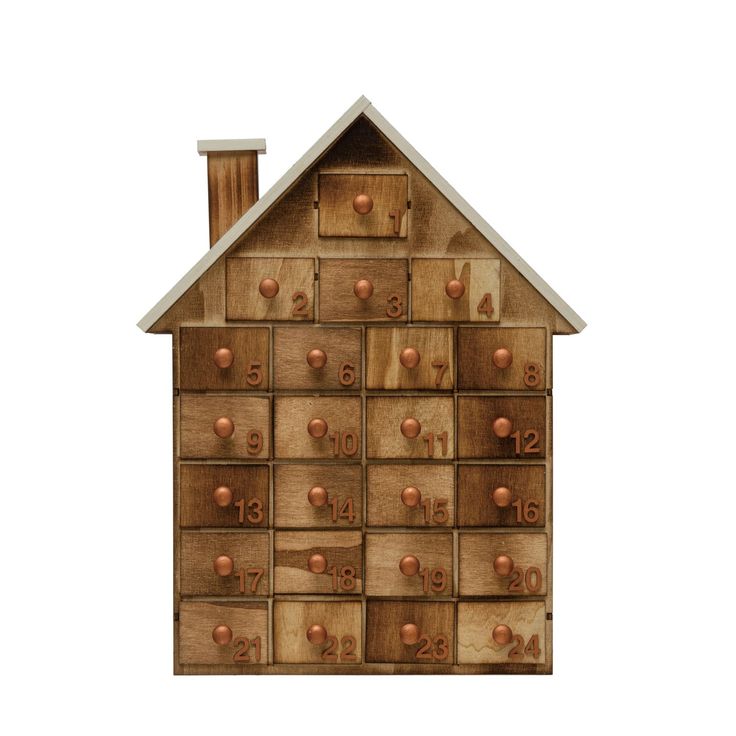 a house made out of wooden boxes with numbers on them