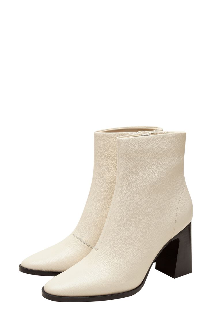 An almond toe and stacked block heel balance a versatile bootie that will complement your polished wardrobe. 3 1/4" heel 5 1/4" shaft Slip-resistant sole Leather upper/textile lining/rubber sole Imported Stacked Heel Ankle Boots Medium Width, Ankle Heeled Boots With Stacked Heel And Medium Width, Ankle Heeled Boots With Stacked Heel, Spring Ankle-high Heeled Boots With Contrasting Heel, Casual Block Heel Boots With Padded Heel, Spring Heeled Boots With Block Heel, Fall Block Heeled Boots With Reinforced Heel, Workwear Booties With Block Reinforced Heel, Workwear Booties With Reinforced Block Heel