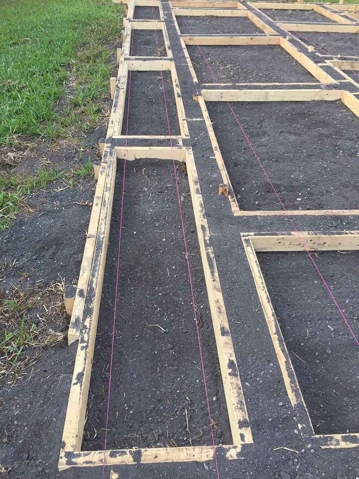 some wooden frames are laying on the ground