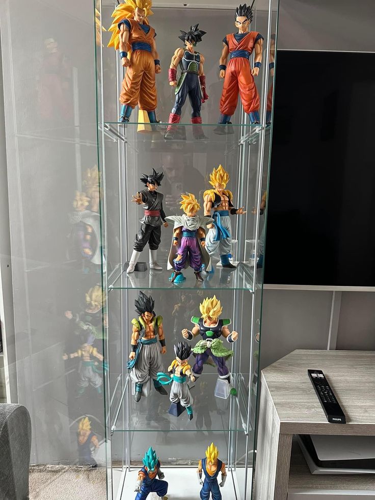 a display case filled with dragon ball figurines