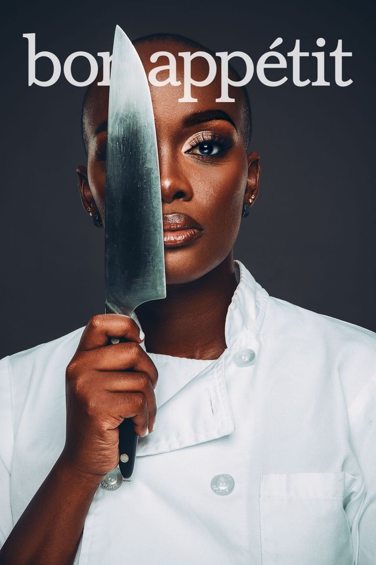 a woman holding a knife in front of her face