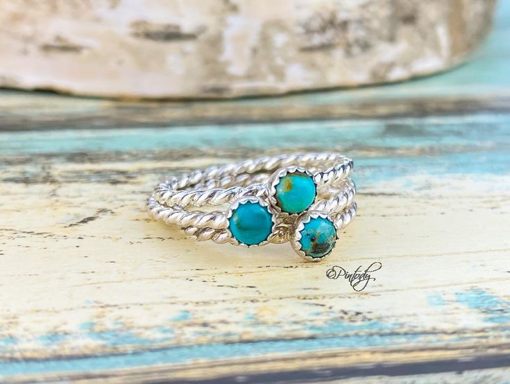 This small 4mm turquoise ring features a delicate but sturdy rope band of sterling silver. The tiny turquoise represents purity, strength, and protection to the wearer. Given as a gift it can bring luck for both the giver and receiver. Stack these with other rings or wear more than one on each hand. These little rings make the perfect midi ring as well as a thumb ring. The band is smooth and comfortable for easy wear. Looks great alone or with other bands or gemstone ring. Made in your size Made Dainty Turquoise Stackable Ring, Dainty Adjustable Turquoise Promise Ring, Dainty Adjustable Stackable Turquoise Ring, Dainty Turquoise Stackable Promise Rings, Custom Class Rings, Bracelet Size Chart, The Giver, Midi Ring, File Box