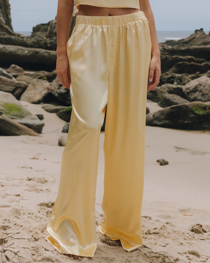 Silky Resort Pants - Butter Luxury Satin Pants For Summer, Cream Bottoms With Elastic Waistband For Day Out, Yellow Pants With Elastic Waistband For Day Out, Chic Yellow Pants With Elastic Waistband, Yellow Bottoms For Spring Loungewear, Yellow Loungewear Bottoms For Spring, Yellow Straight Leg Bottoms For Summer, Chic Yellow Straight Leg Bottoms, Cream Wide Leg Summer Pants