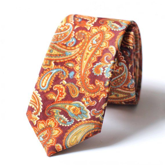 • 2.5" at the widest point• Approximately 58" in Length• Handmade• 100% Cotton• Dry Clean onlyVintage style floral print. This tie is suitable for weddings, proms, casual throw downs, dinner and all special occasions. This tie will certainly start the conversation with lots of compliments. Please note that due to differences in computer monitors, colors may vary slightly from those shown Fitted Paisley Print Suit And Tie Accessories For Wedding, Multicolor Fitted Suit And Tie Accessories For Wedding, Wedding Ties With Paisley Print, Wedding Paisley Print Tie, Wedding Paisley Print Standard Tie, Untied Bow Tie, Men Street Style, Wedding Tie, Floral Bow Tie